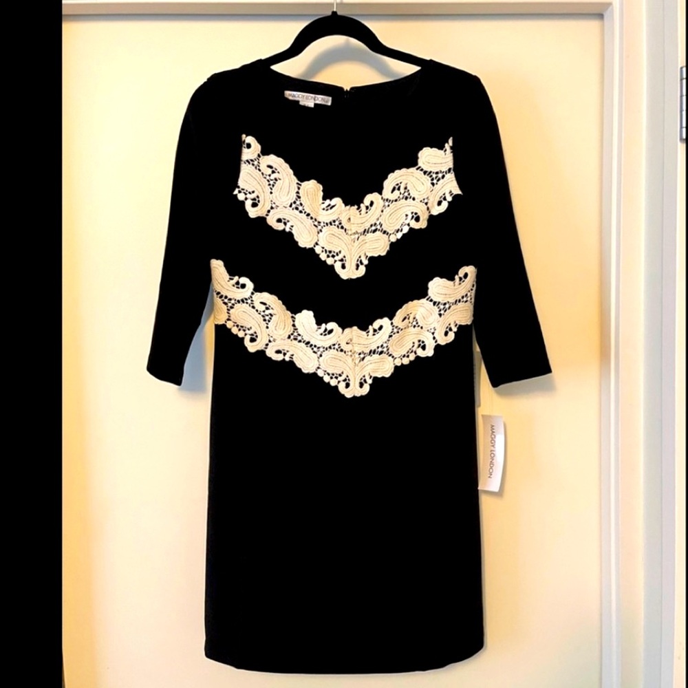 Brand new Maggy London black dress with appliqué